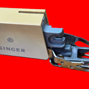 slant shank singer sewing machine genuine #6 walking foot. includes random color zipper bag. discoloration from age or sitting near a window.
