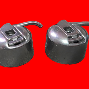 kenmore sewing machine 2 pack class 15 right finger bobbin case y on side in good condition. lot 2p12. fits all japanese badge class 15 machines some of singer 15 sewing machines, some singer class 15 machines require an opposite finger.